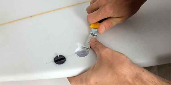 How to change a broken fin plug on your surfboard